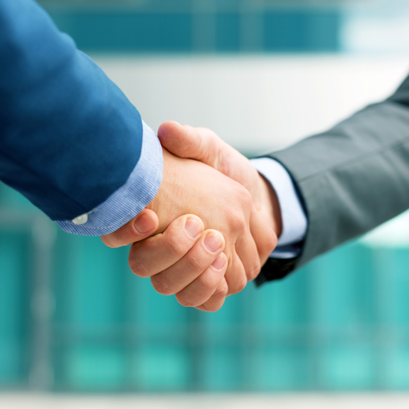 Photo of a handshake between two people